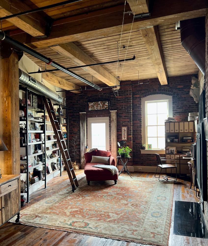 study area in an attic with big windows