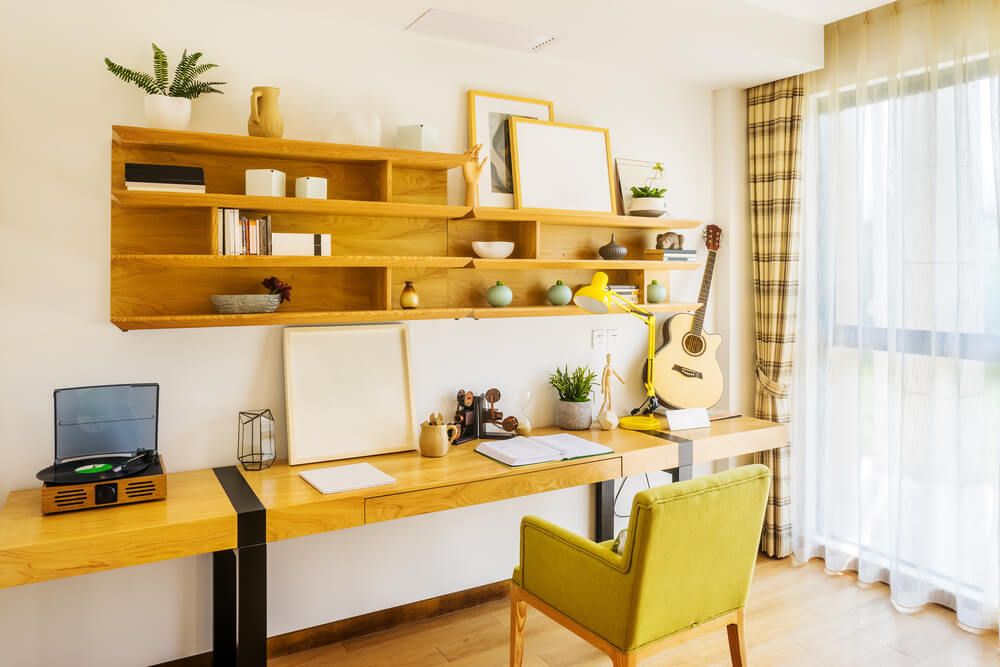 study area with a desk against the wall