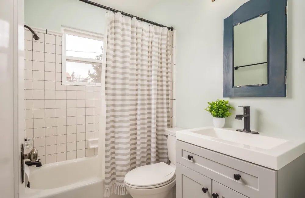 small bathroom designed in neutral colors